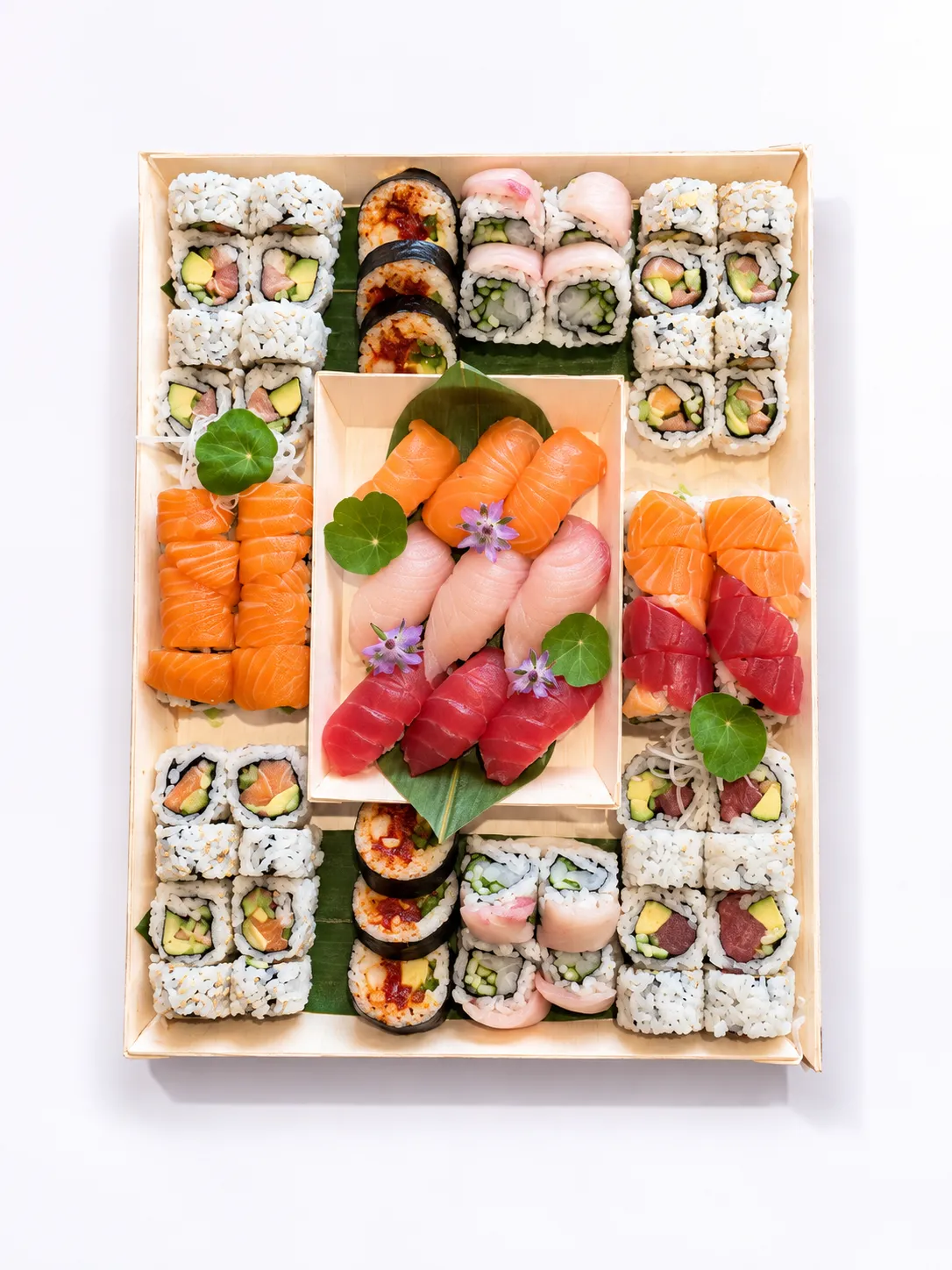 Variety Box catering tray with assorted rolls and salmon, tuna and yellowtail nigiri